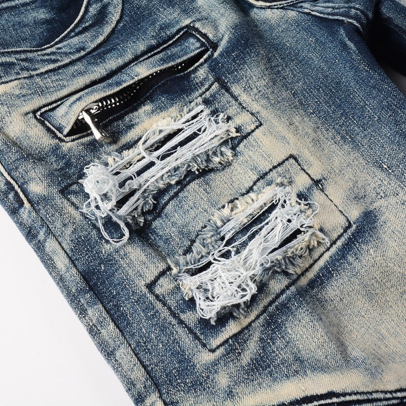 Blaue gesegnete Jeans