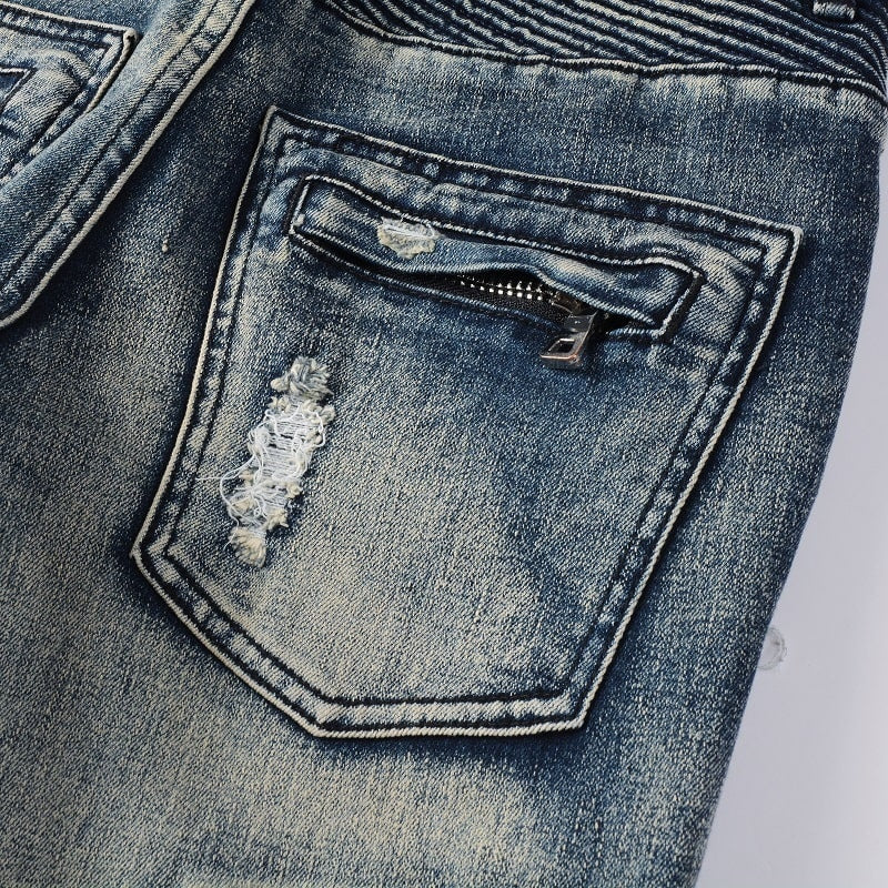 Blaue gesegnete Jeans