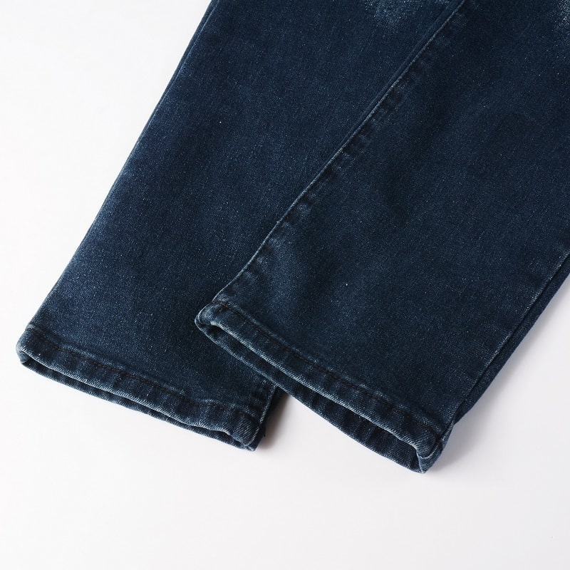 Blaue gesegnete Jeans