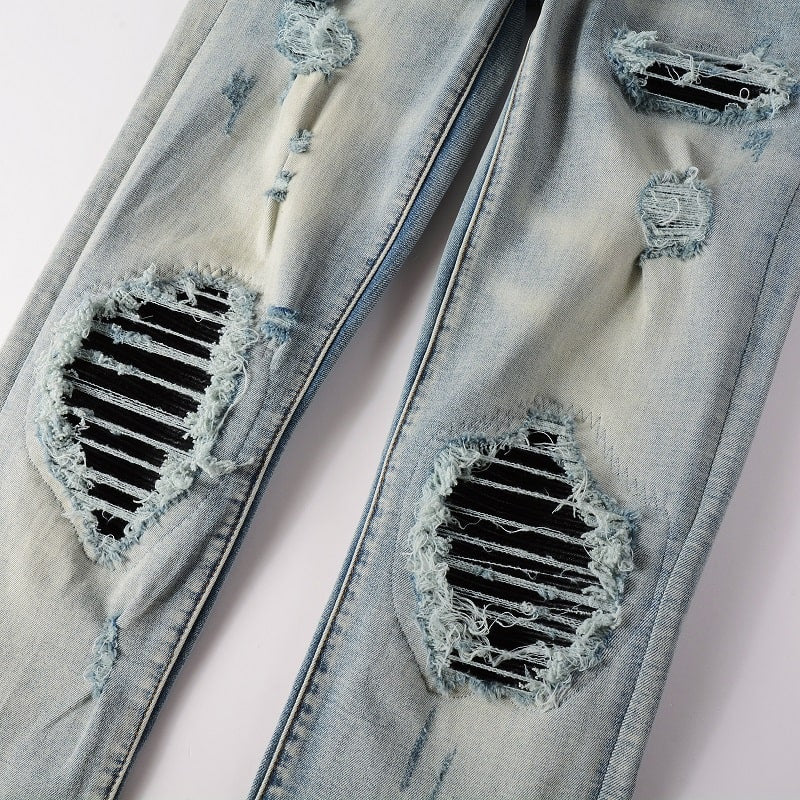 Jeans mit Lederaufnäher