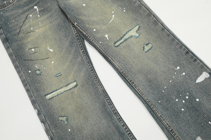 Lackierte Schlagjeans