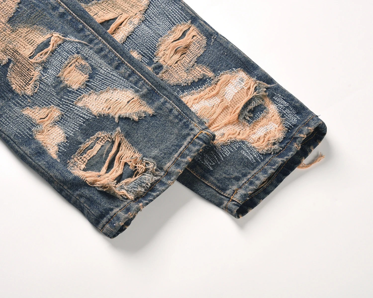 Distressed Cream Jeans