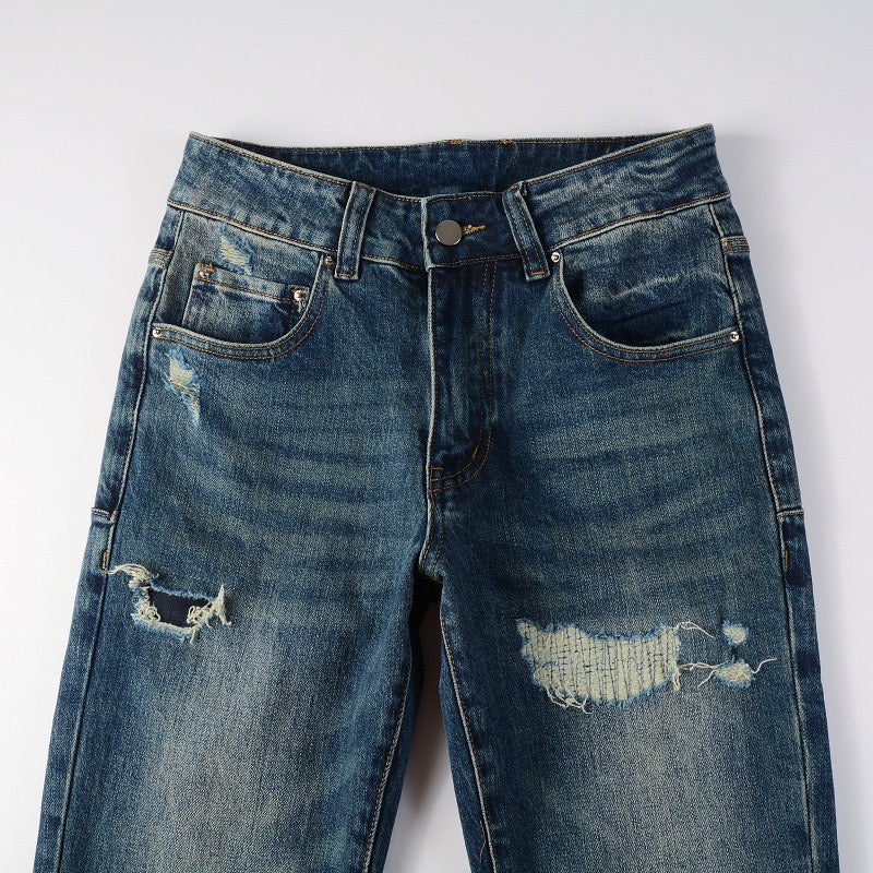 Blue Tear Patch Jeans