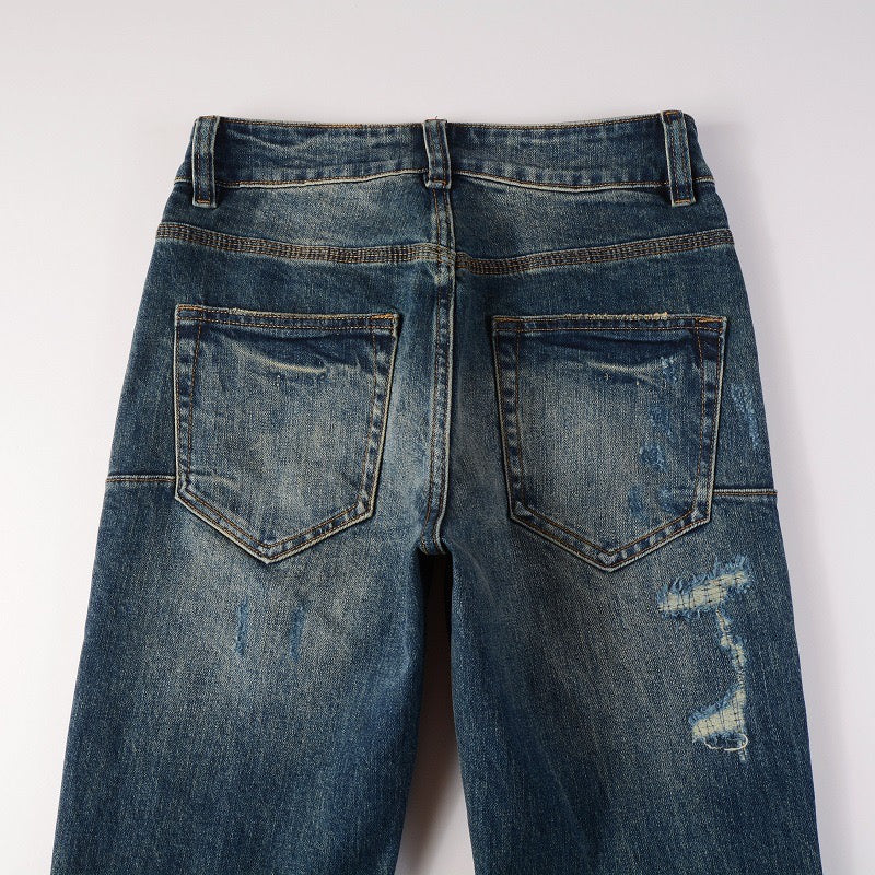 Blue Tear Patch Jeans