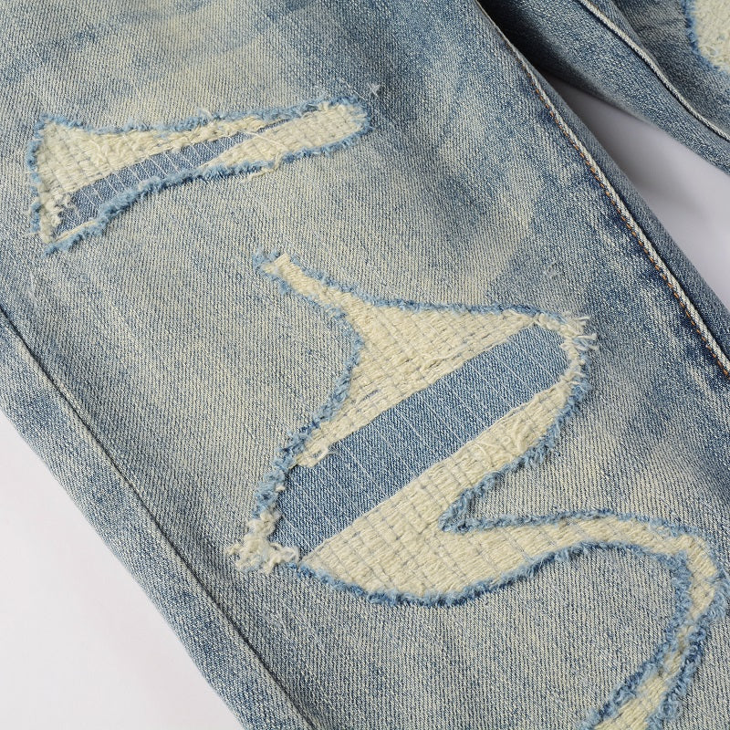 Tear Patch Jeans