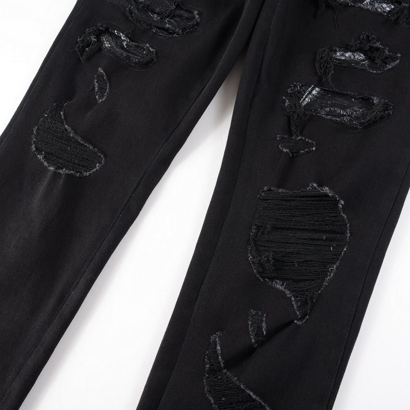 Schwarze Schlangenjeans