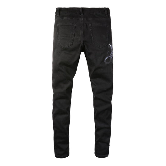 Schwarze Schlangenjeans
