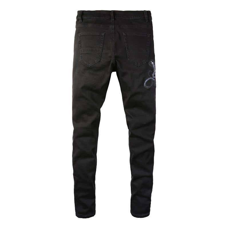 Schwarze Schlangenjeans
